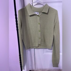 Selling this button light green cardigan.